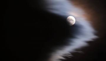 Moon through the cloud